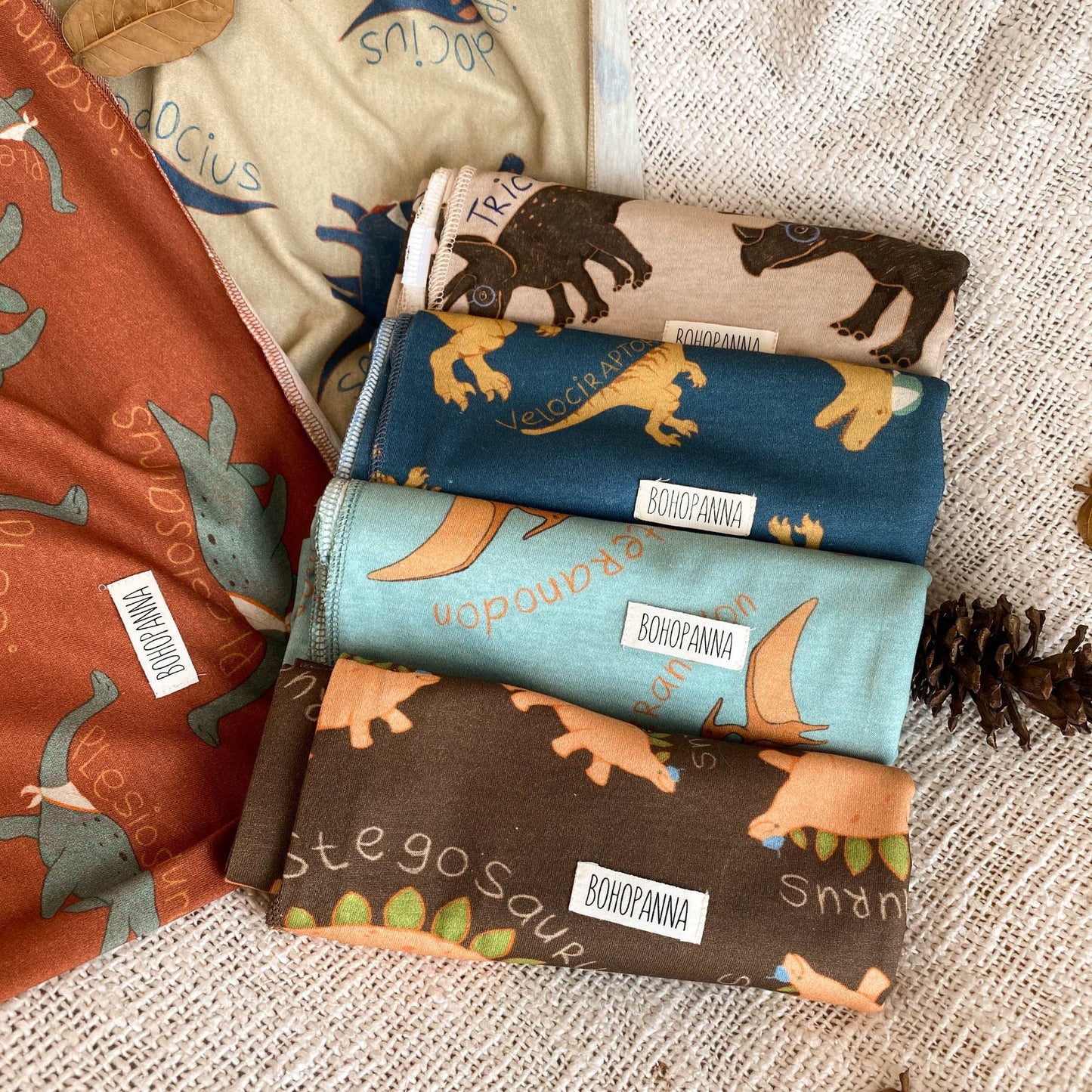 SWADDLE DINO